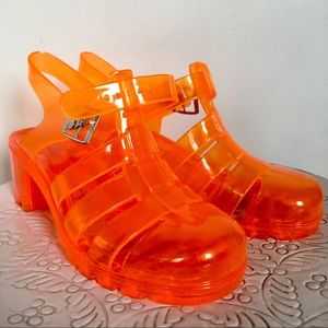 Neon orange 90’s inspired buckle heeled jelly shoe